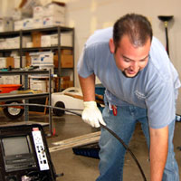 Mesquite Texas plumber uses a SeeSnake pipe camera